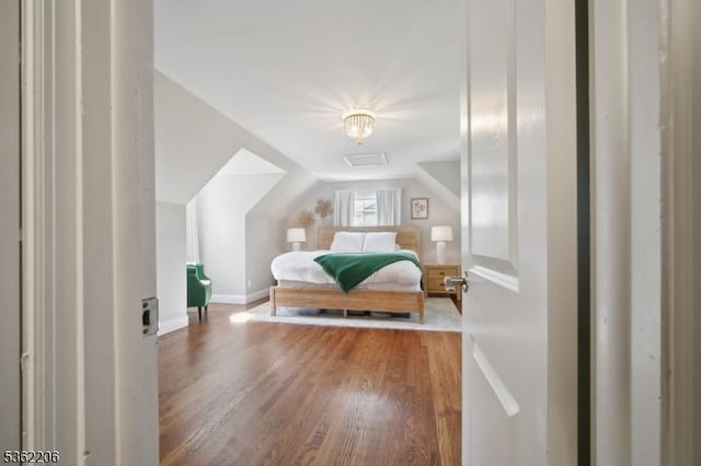 11 Western Blvd, Long Hill Twp, NJ 07933 - bedroom featuring wood finished floors, lofted ceiling, and baseboards