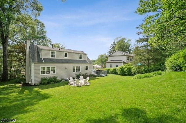 11 Western Blvd, Long Hill Twp, NJ 07933 - rear view of property with a chimney and a yard