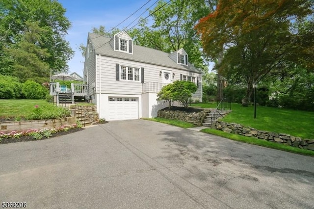 11 Western Blvd, Long Hill Twp, NJ 07933 - new england style home with stairway, asphalt driveway, a garage, and a front lawn