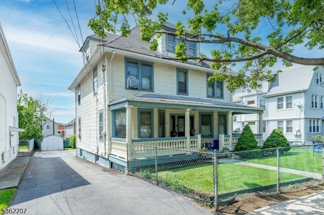 60 Ella St, Bloomfield Twp, NJ 07003 - traditional style home featuring covered porch, a fenced front yard, and a gate