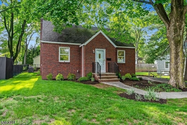 248 Knickerbocker Rd, Closter Boro, NJ 07624 - view of front of house with brick siding, roof with shingles, and a chimney