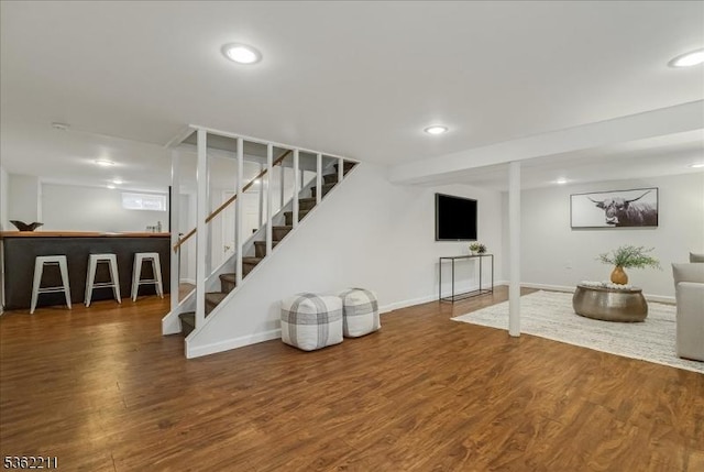 248 Knickerbocker Rd, Closter Boro, NJ 07624 - finished below grade area featuring stairway, wood finished floors, bar, recessed lighting, and baseboards