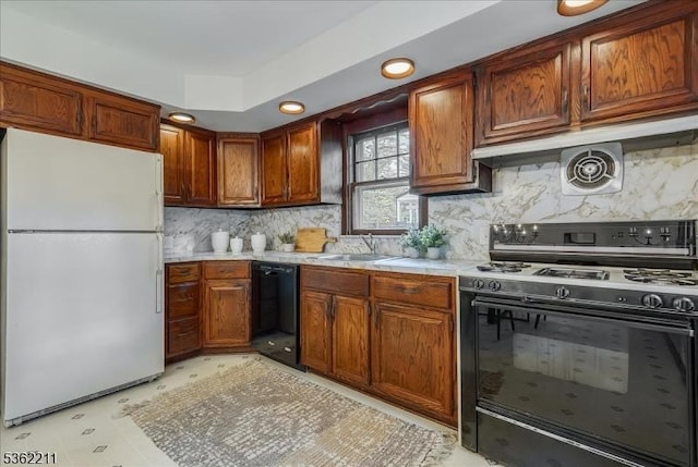 248 Knickerbocker Rd, Closter Boro, NJ 07624 - kitchen with black appliances, light countertops, a sink, backsplash, and recessed lighting