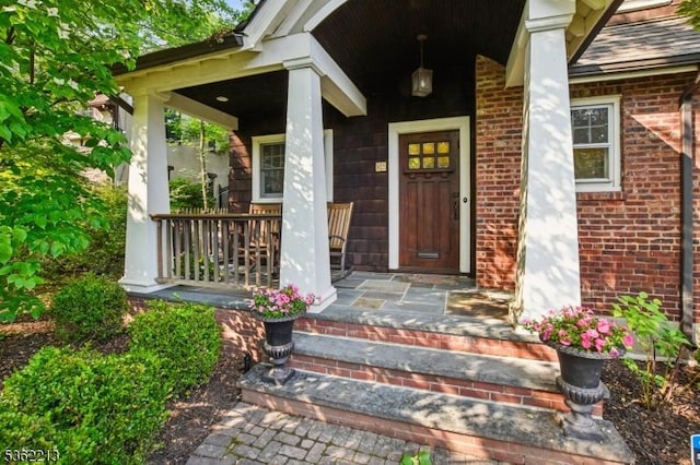 89 Maple St, Millburn Twp, NJ 07041 - entrance to property featuring a porch and brick siding