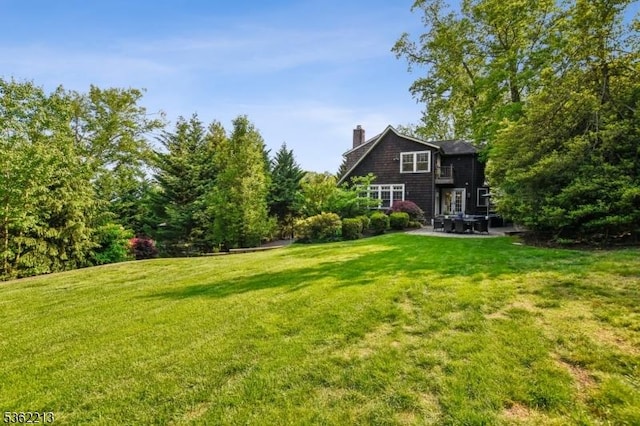 89 Maple St, Millburn Twp, NJ 07041 - view of green lawn featuring a patio