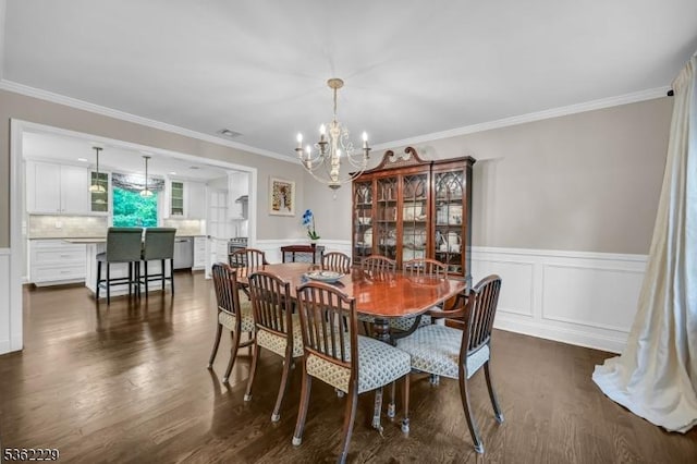 48 Kahdena Rd, Morris Twp, NJ 07960 - dining area with a chandelier, ornamental molding, dark wood-type flooring, and a wainscoted wall