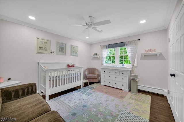 48 Kahdena Rd, Morris Twp, NJ 07960 - bedroom with baseboard heating, recessed lighting, wood finished floors, a crib, and crown molding