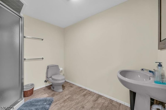 48 Kahdena Rd, Morris Twp, NJ 07960 - full bath featuring a shower stall, wood finished floors, toilet, and baseboards