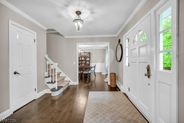 48 Kahdena Rd, Morris Twp, NJ 07960 - entrance foyer with a chandelier, wood finished floors, stairway, baseboard heating, and ornamental molding