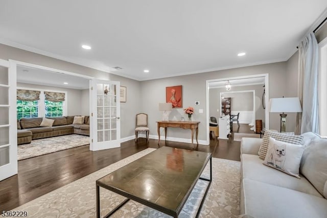 48 Kahdena Rd, Morris Twp, NJ 07960 - living area with wood finished floors, ornamental molding, recessed lighting, baseboards, and french doors