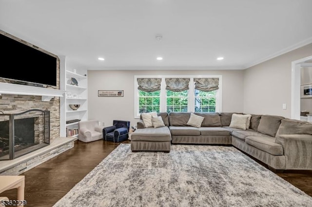 48 Kahdena Rd, Morris Twp, NJ 07960 - living room with recessed lighting, dark wood-type flooring, ornamental molding, a stone fireplace, and built in shelves