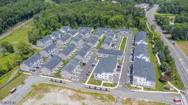 9 Mccluskey Pl, Morris Plains Boro, NJ 07950 - view of property location with a heavily wooded area