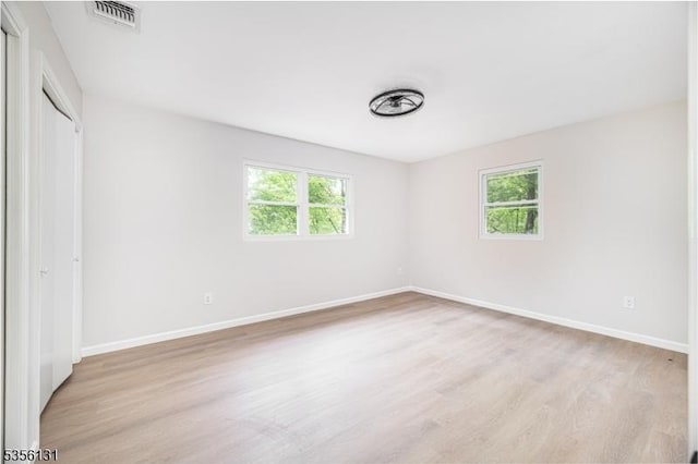 10 Maple Dr, Vernon Twp, NJ 07461 - unfurnished bedroom with light wood-type flooring, baseboards, and a closet