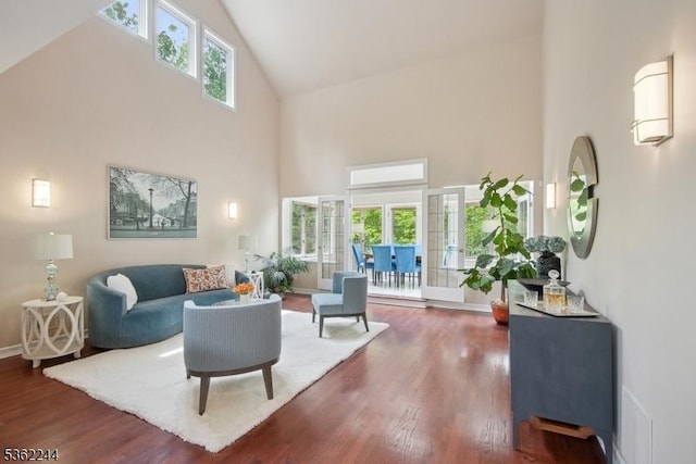25 Hook Mountain Dr, Clinton Twp, NJ 08801 - living area featuring high vaulted ceiling, healthy amount of natural light, wood finished floors, and baseboards