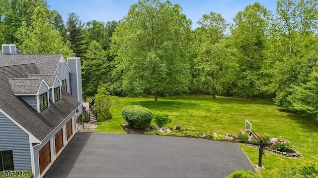 25 Hook Mountain Dr, Clinton Twp, NJ 08801 - view of grassy yard with asphalt driveway