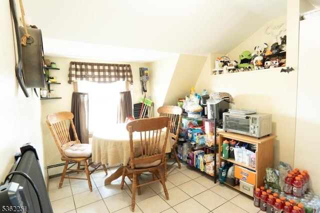 513 Maple Ave, Elizabeth City, NJ 07202 - dining room featuring lofted ceiling and light tile patterned flooring
