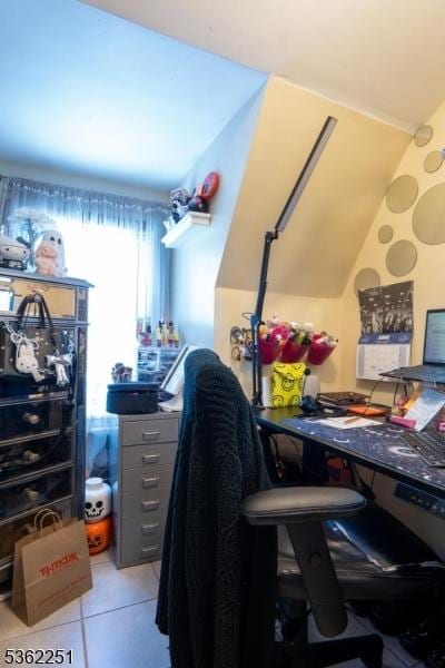 513 Maple Ave, Elizabeth City, NJ 07202 - home office with lofted ceiling and light tile patterned flooring
