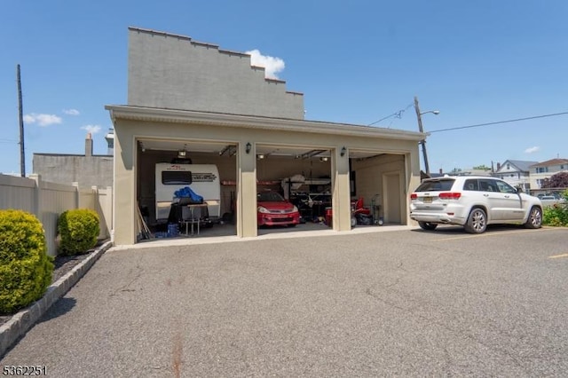 513 Maple Ave, Elizabeth City, NJ 07202 - view of parking / parking lot featuring a garage