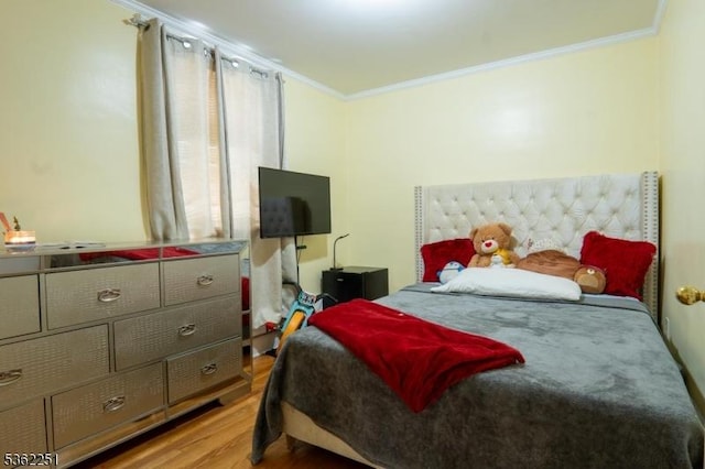 513 Maple Ave, Elizabeth City, NJ 07202 - bedroom featuring ornamental molding and wood finished floors