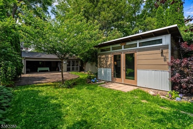 179 W Fairview Ave, South Orange Village Twp, NJ 07079 - rear view of property with a yard, an outdoor structure, and a patio