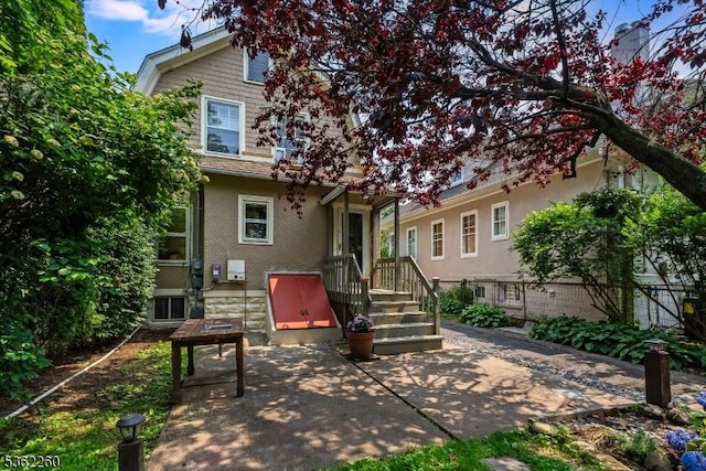 179 W Fairview Ave, South Orange Village Twp, NJ 07079 - back of property with stucco siding and a patio