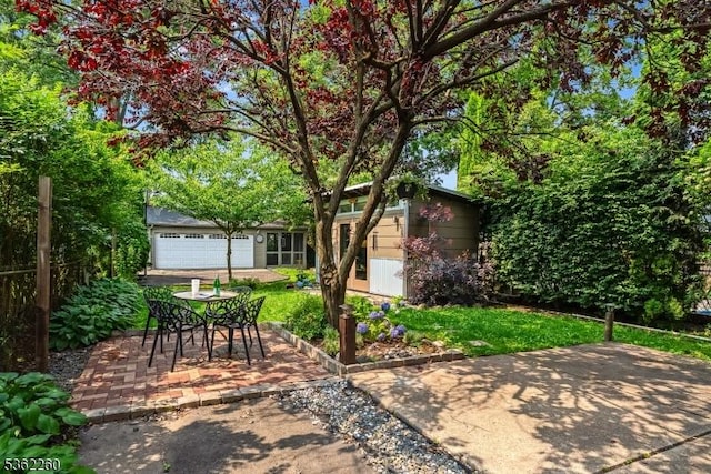 179 W Fairview Ave, South Orange Village Twp, NJ 07079 - view of yard featuring a patio, an outbuilding, and a garage