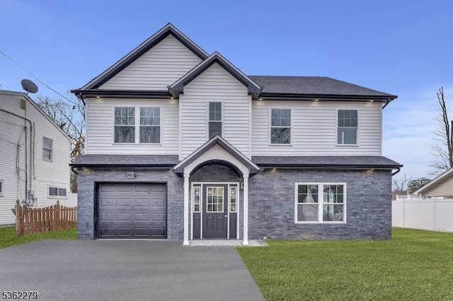 28 Kenmore Rd, Edison Twp, NJ 08817 - traditional-style home featuring an attached garage, stone siding, and driveway
