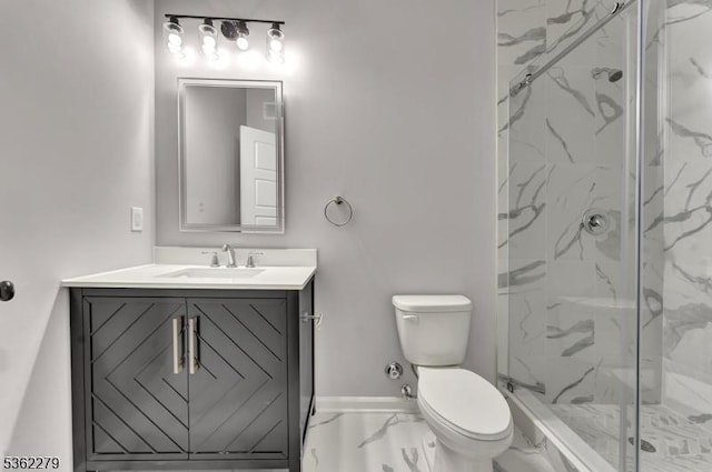 28 Kenmore Rd, Edison Twp, NJ 08817 - full bathroom with marble look tiles, a marble finish shower, vanity, toilet, and baseboards