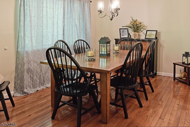 9B Foxwood Dr Unit B, Morris Plains Boro, NJ 07950 - dining area featuring a chandelier, wood finished floors, and baseboards