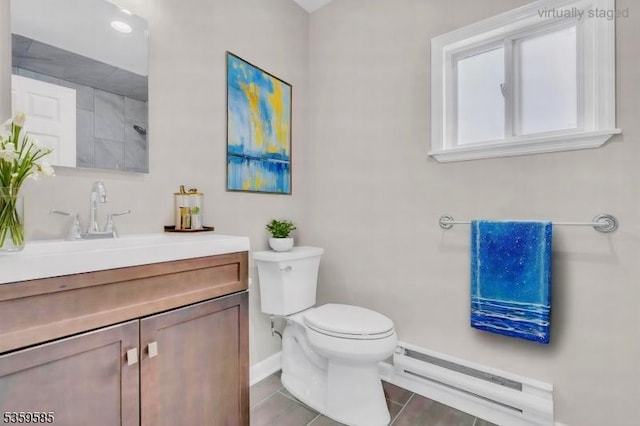 10 Rutgers Way, Hopatcong Boro, NJ 07843 - full bath featuring a baseboard radiator, toilet, baseboards, vanity, and tile patterned flooring