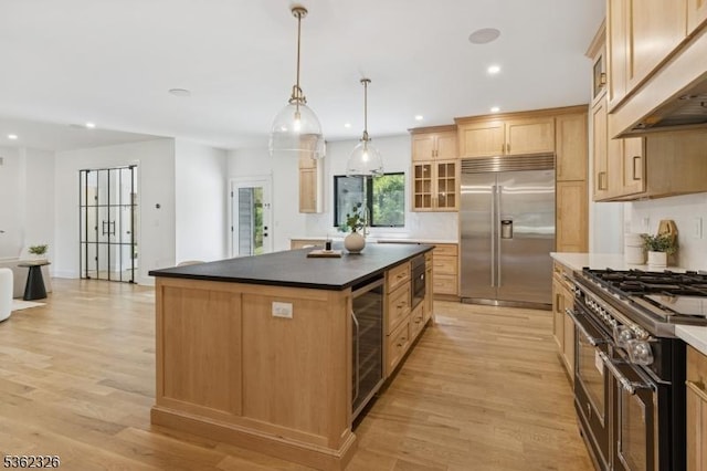 121 Culberson Rd, Bernards Twp, NJ 07920 - kitchen featuring built in appliances, wine cooler, glass insert cabinets, dark countertops, and premium range hood