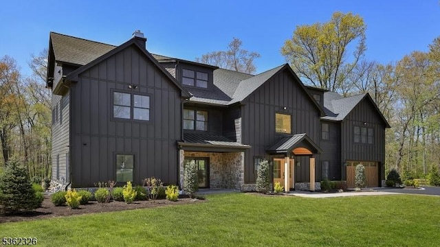 121 Culberson Rd, Bernards Twp, NJ 07920 - modern inspired farmhouse with board and batten siding, a front lawn, roof with shingles, a chimney, and a standing seam roof