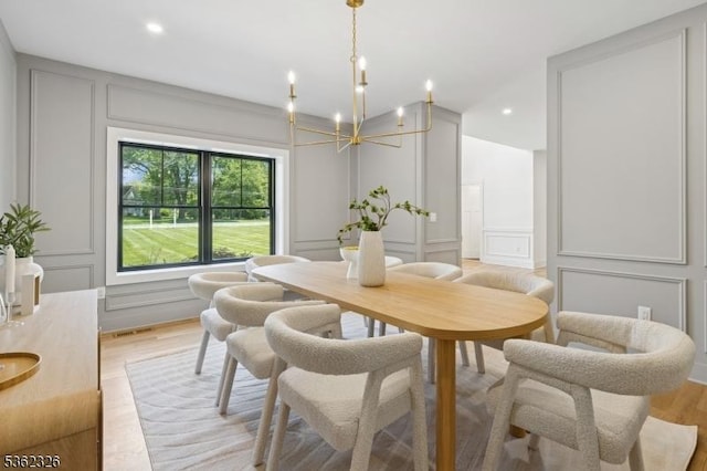 121 Culberson Rd, Bernards Twp, NJ 07920 - dining room featuring a decorative wall, a chandelier, light wood finished floors, and recessed lighting