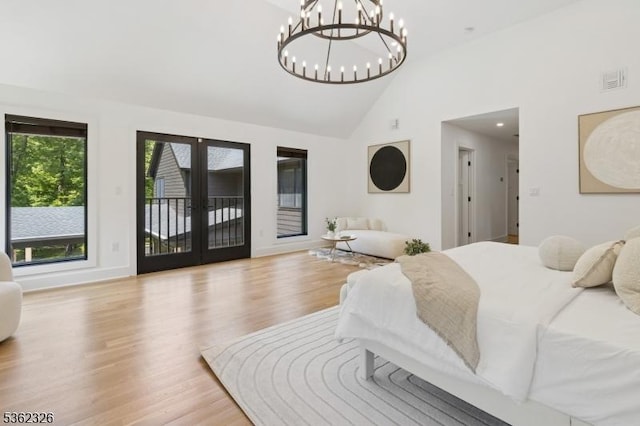 121 Culberson Rd, Bernards Twp, NJ 07920 - bedroom with french doors, access to exterior, wood finished floors, high vaulted ceiling, and a chandelier