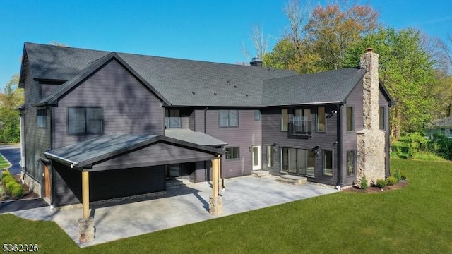 121 Culberson Rd, Bernards Twp, NJ 07920 - back of property with a yard, a chimney, a patio area, and roof with shingles