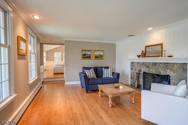 22 Hilltop Cir, Mendham Twp, NJ 07945 - living area featuring a baseboard heating unit, light wood finished floors, ornamental molding, and a fireplace