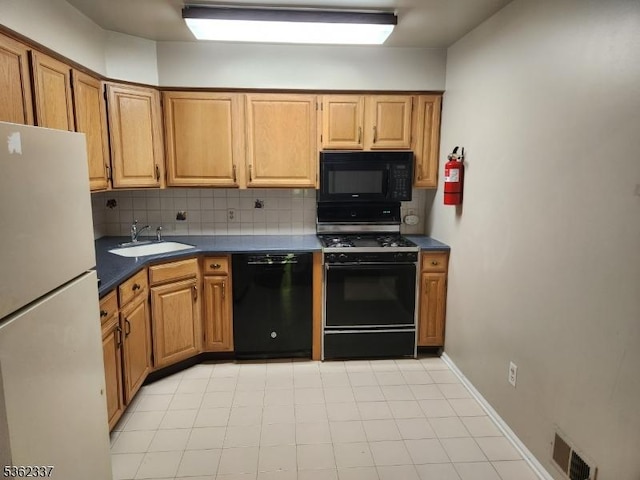 5102 Austin Ct Unit 02, Independence Twp, NJ 07840 - kitchen with black appliances, a sink, decorative backsplash, and dark countertops