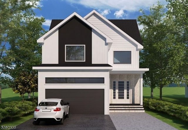 74 Hillside Ter, Livingston Twp, NJ 07039 - view of front of house featuring an attached garage and asphalt driveway