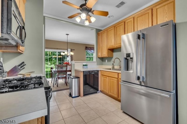 70 River Birch Cir, Montgomery Twp, NJ 08540 - kitchen featuring stainless steel appliances, light countertops, ceiling fan, light tile patterned floors, and a chandelier