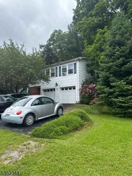 61 N Hillside Ave, Roxbury Twp, NJ 07847 - view of outbuilding with a garage and driveway