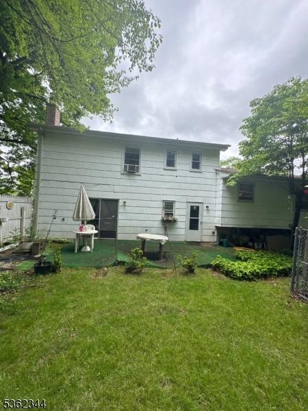 61 N Hillside Ave, Roxbury Twp, NJ 07847 - back of house featuring a chimney