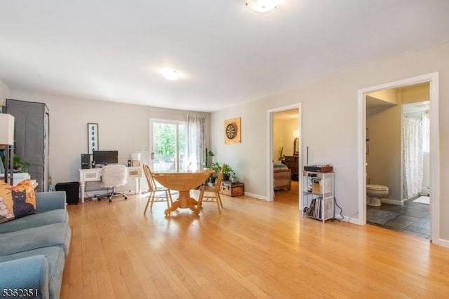 40 Riveredge Dr, Fairfield Twp, NJ 07004 - living room featuring light wood-style flooring and baseboards