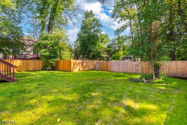 40 Riveredge Dr, Fairfield Twp, NJ 07004 - view of yard featuring stairway