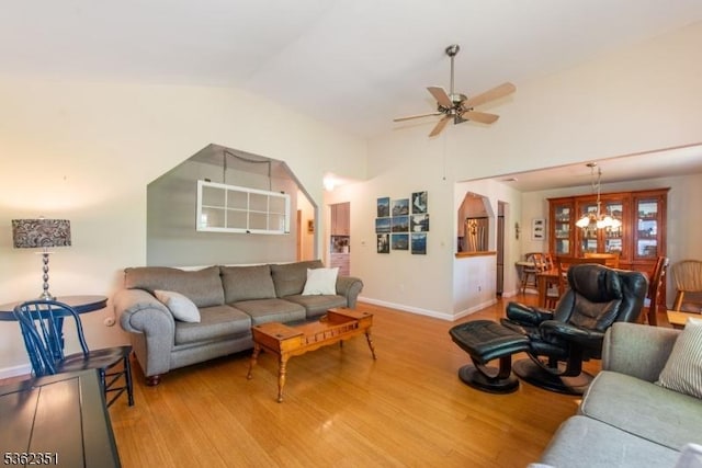 40 Riveredge Dr, Fairfield Twp, NJ 07004 - living area with lofted ceiling, wood finished floors, baseboards, and a ceiling fan