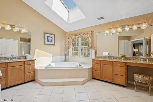 15 Middlesworth Farm Rd, Washington Twp, NJ 07853 - full bath featuring vaulted ceiling, a skylight, two vanities, a shower stall, and a bath