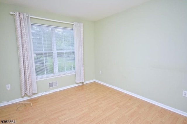 197 Potomac Dr, Bernards Twp, NJ 07920 - spare room featuring baseboards and wood finished floors
