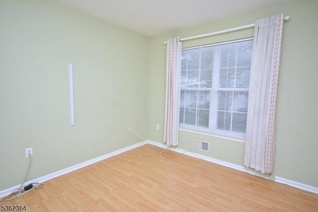 197 Potomac Dr, Bernards Twp, NJ 07920 - empty room featuring wood finished floors and baseboards