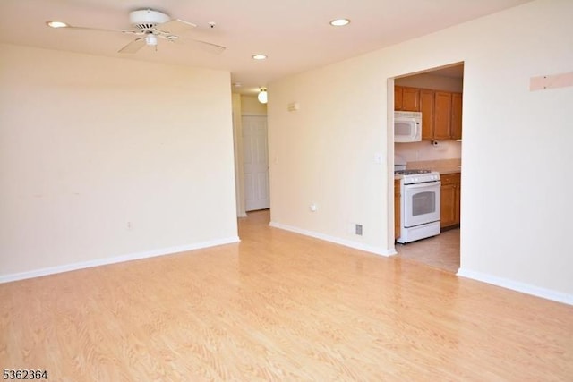 197 Potomac Dr, Bernards Twp, NJ 07920 - unfurnished living room with light wood-style flooring, a ceiling fan, and recessed lighting