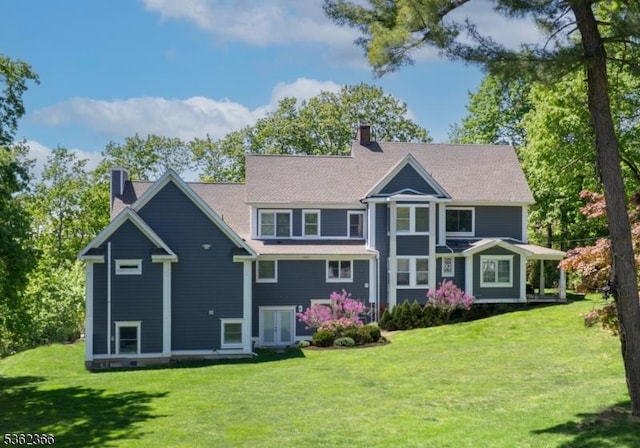 1417 Long Hill Rd, Long Hill Twp, NJ 07946 - rear view of property with a chimney, a lawn, and french doors
