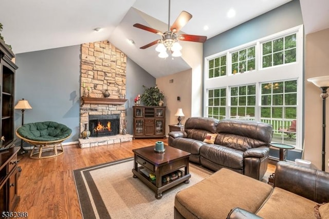 16 Olde York Rd, Randolph Twp, NJ 07869 - living area featuring ceiling fan, wood finished floors, a fireplace, and high vaulted ceiling
